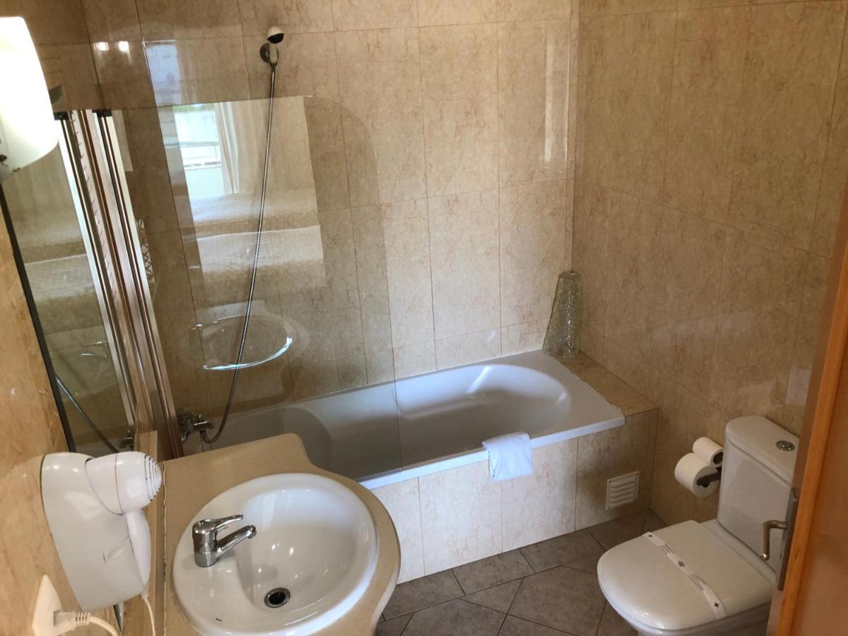 Apartamentos Pomba Branca 奥霍斯德古阿 外观 照片